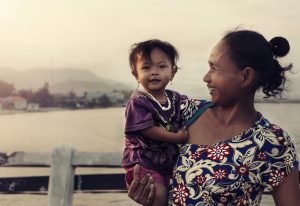 a mother with her children in Cambodia