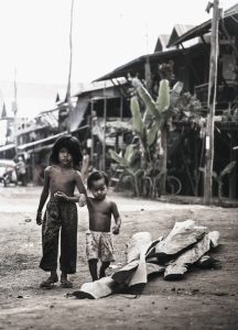 two young people from the floating village in cambodia