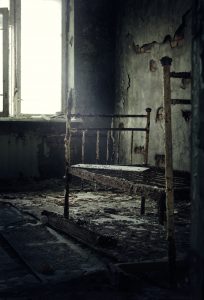 bed in an abandoned apartment